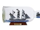 Ed Low's Rose Pink Model Ship in a Glass Bottle 11""